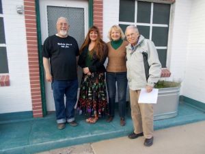 TACA members outside the station